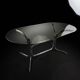 Silver metal table with smoked glass top from the 1970s.