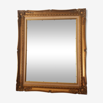 Old gilded frame in solid wood and plaster.