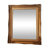 Old gilded frame in solid wood and plaster.