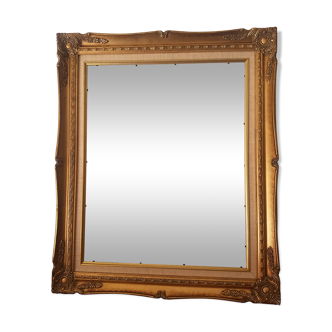 Old gilded frame in solid wood and plaster.