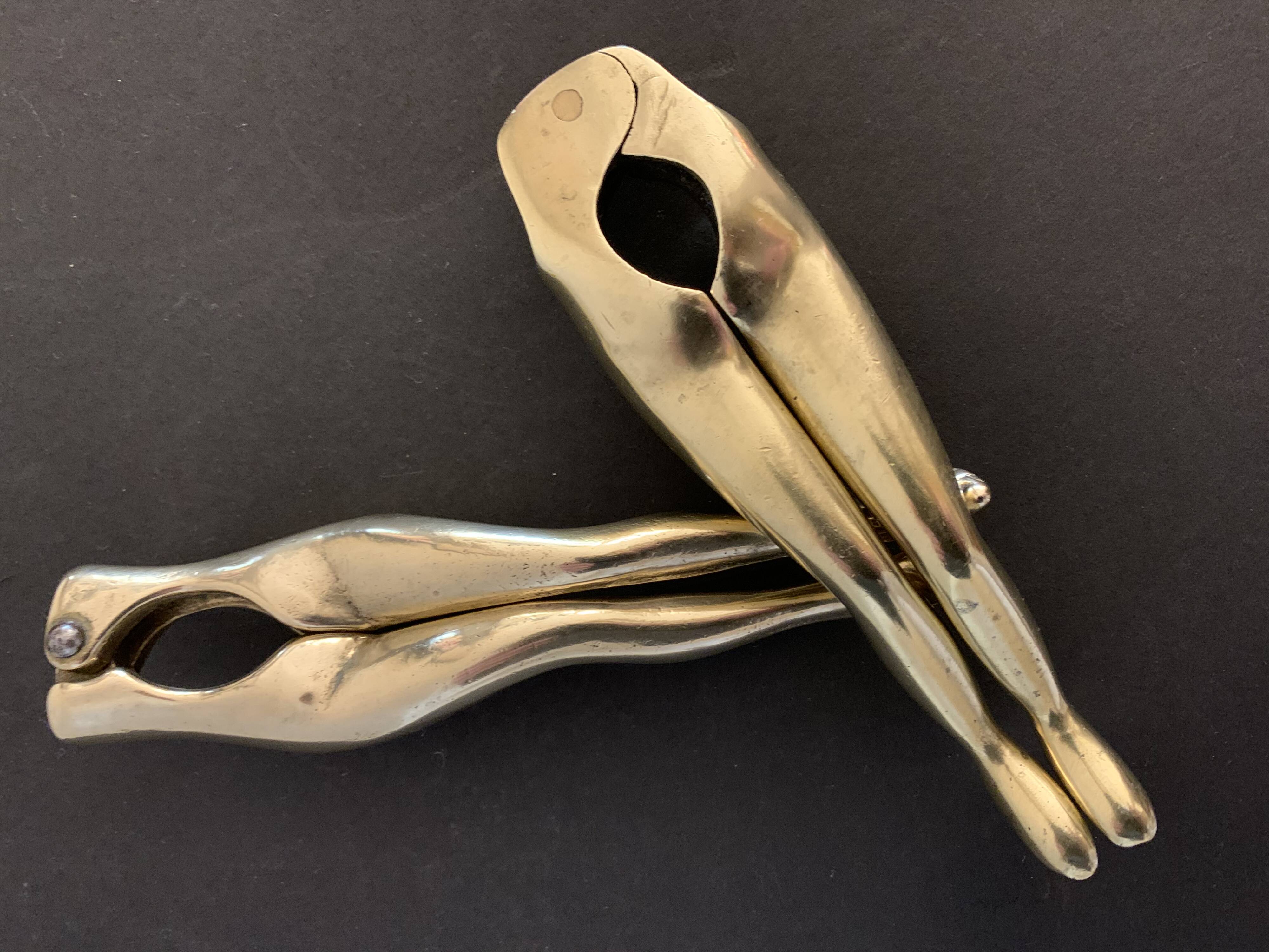 Pair of nutcrackers or anthropomorphic hazelnuts in bronze