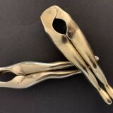 Pair of nutcrackers or anthropomorphic hazelnuts in bronze