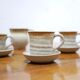 Série de 4 tasses et un pot à lait vintage en grès