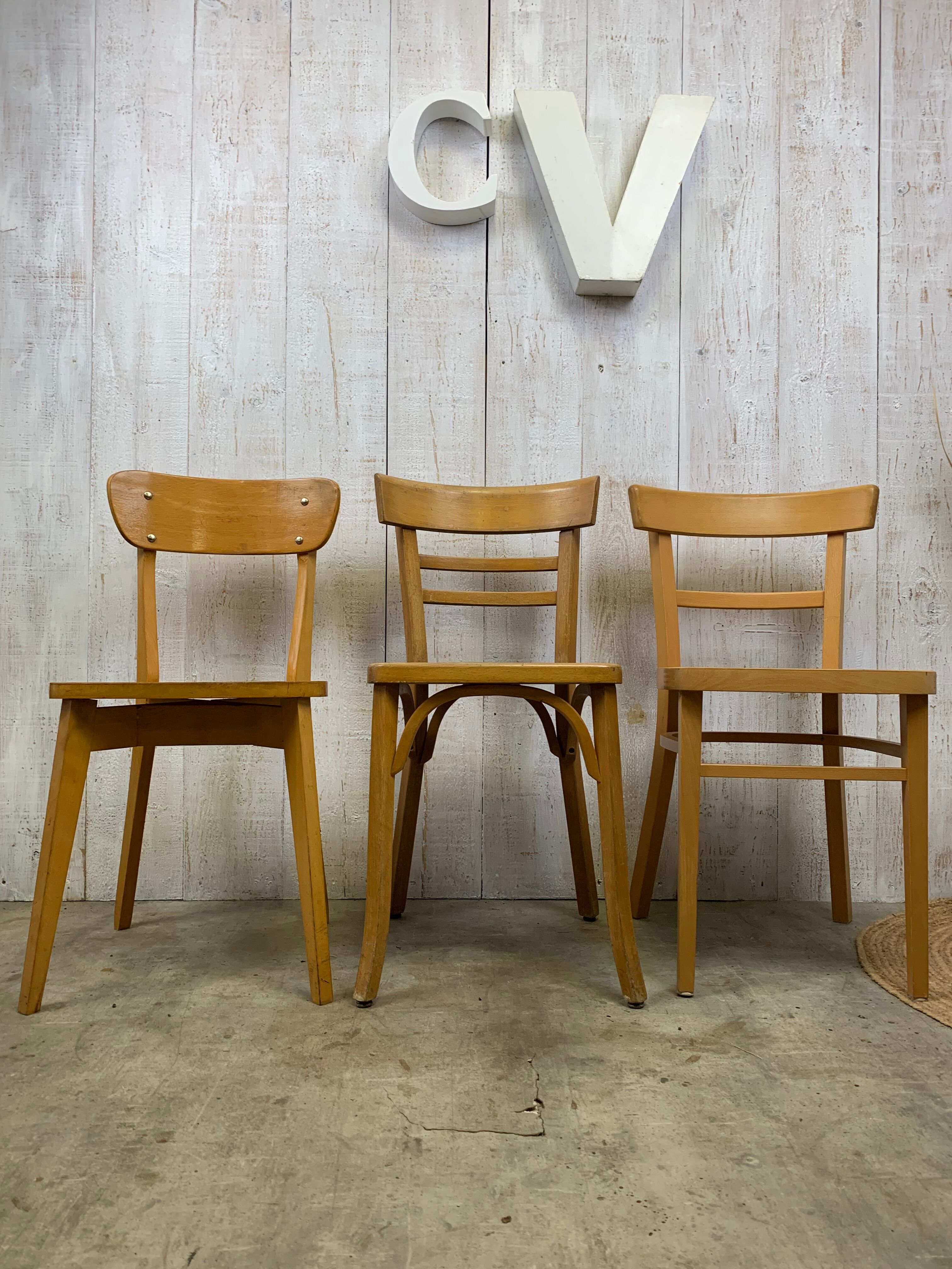 Lot 3 mismatched bistro chairs