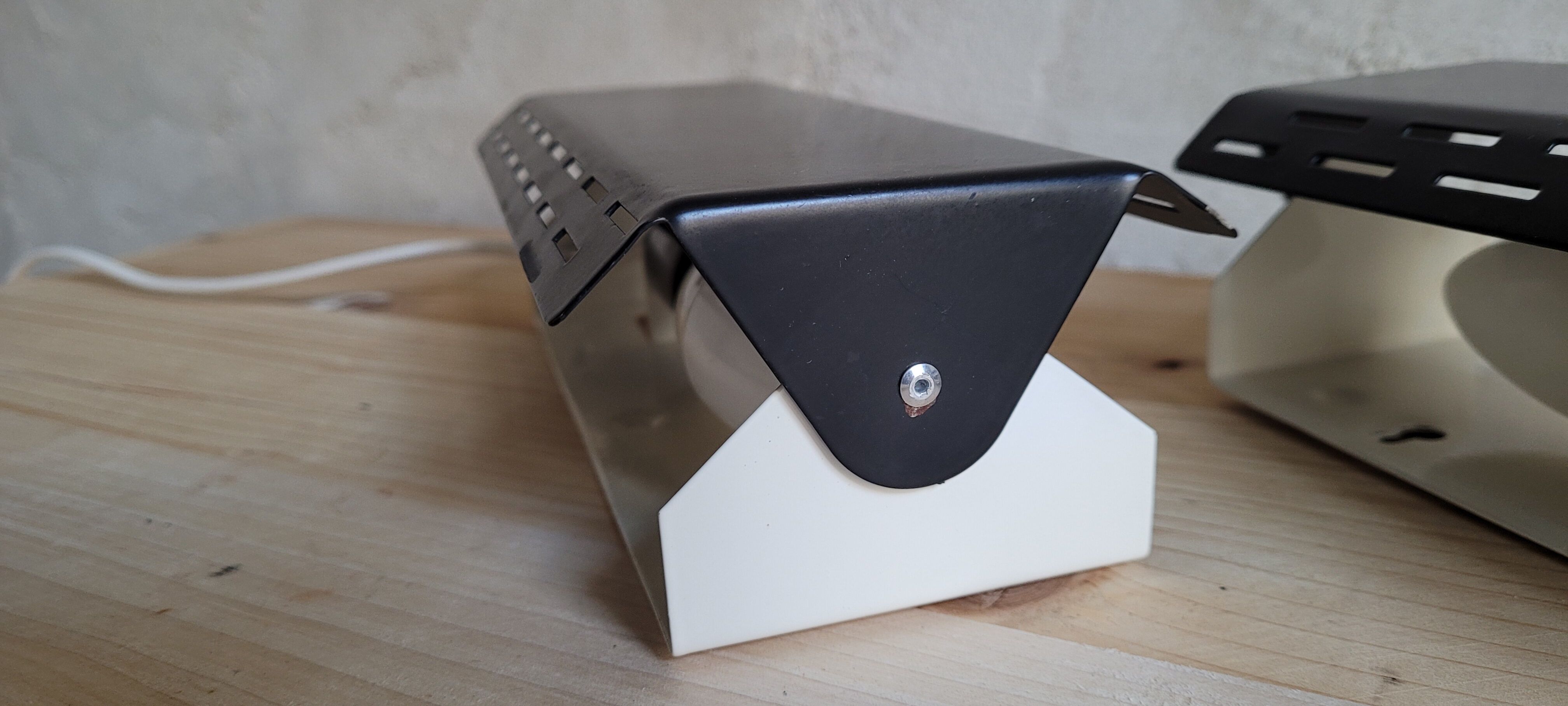 Pair of wall sconces with adjustable shutter