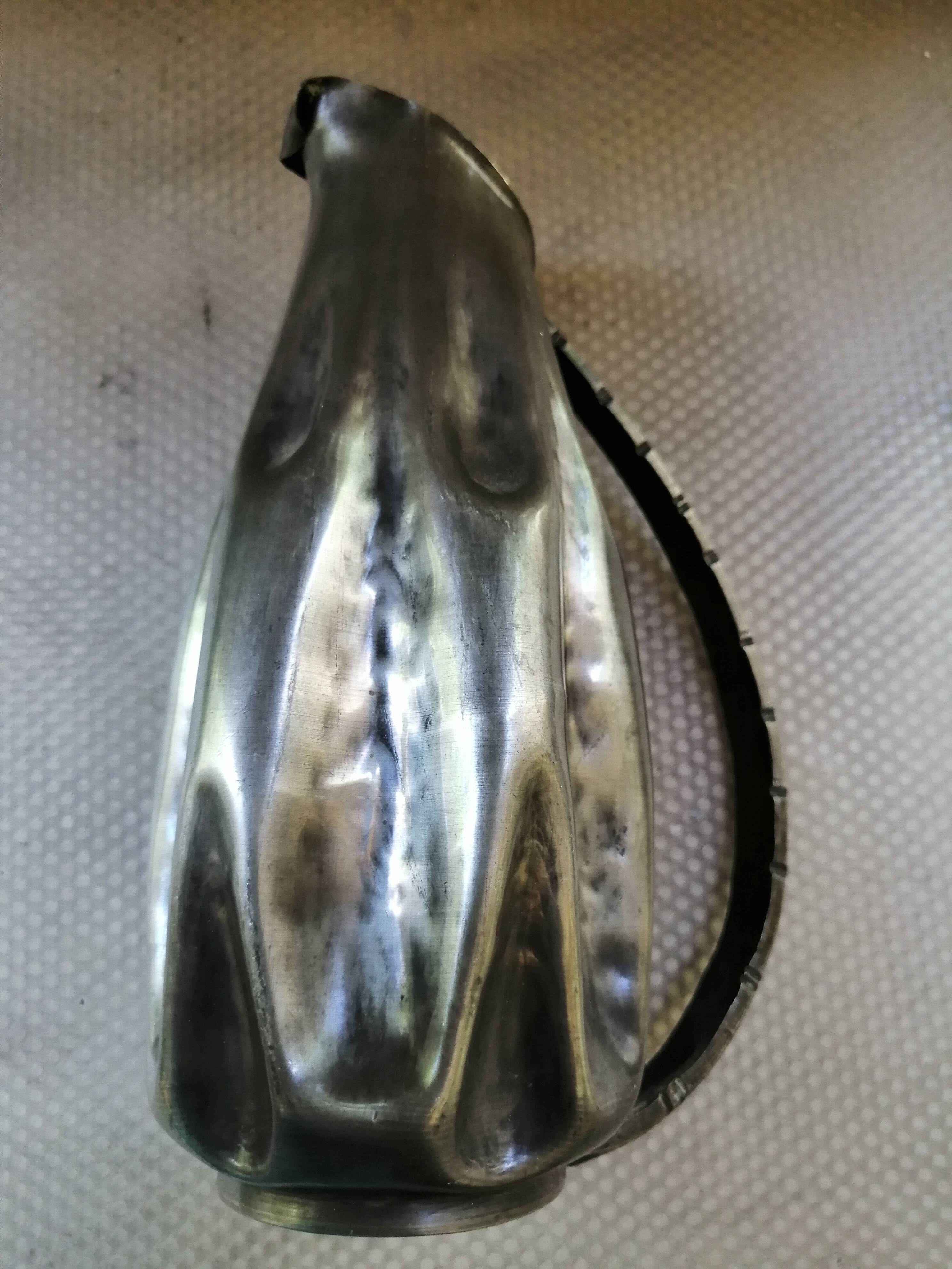 Tin pitcher signed and dated 1922