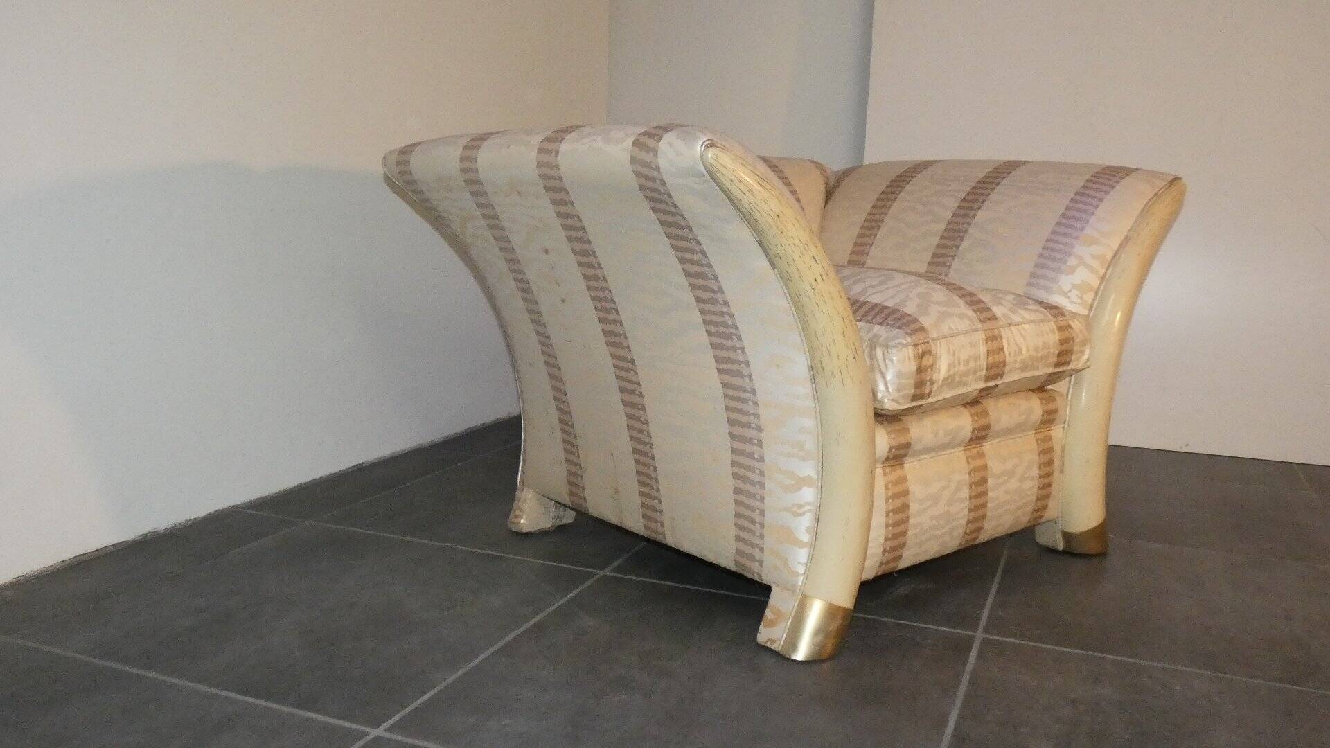 Sofa and armchair in colonial style with saber legs in resin, Italy, 1970s.