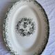 Oval dish with green motorcycles Terre de Fer