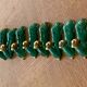 8 knife-wielding gazelles dabbling in green enamelled ceramic and vintage gold 1950