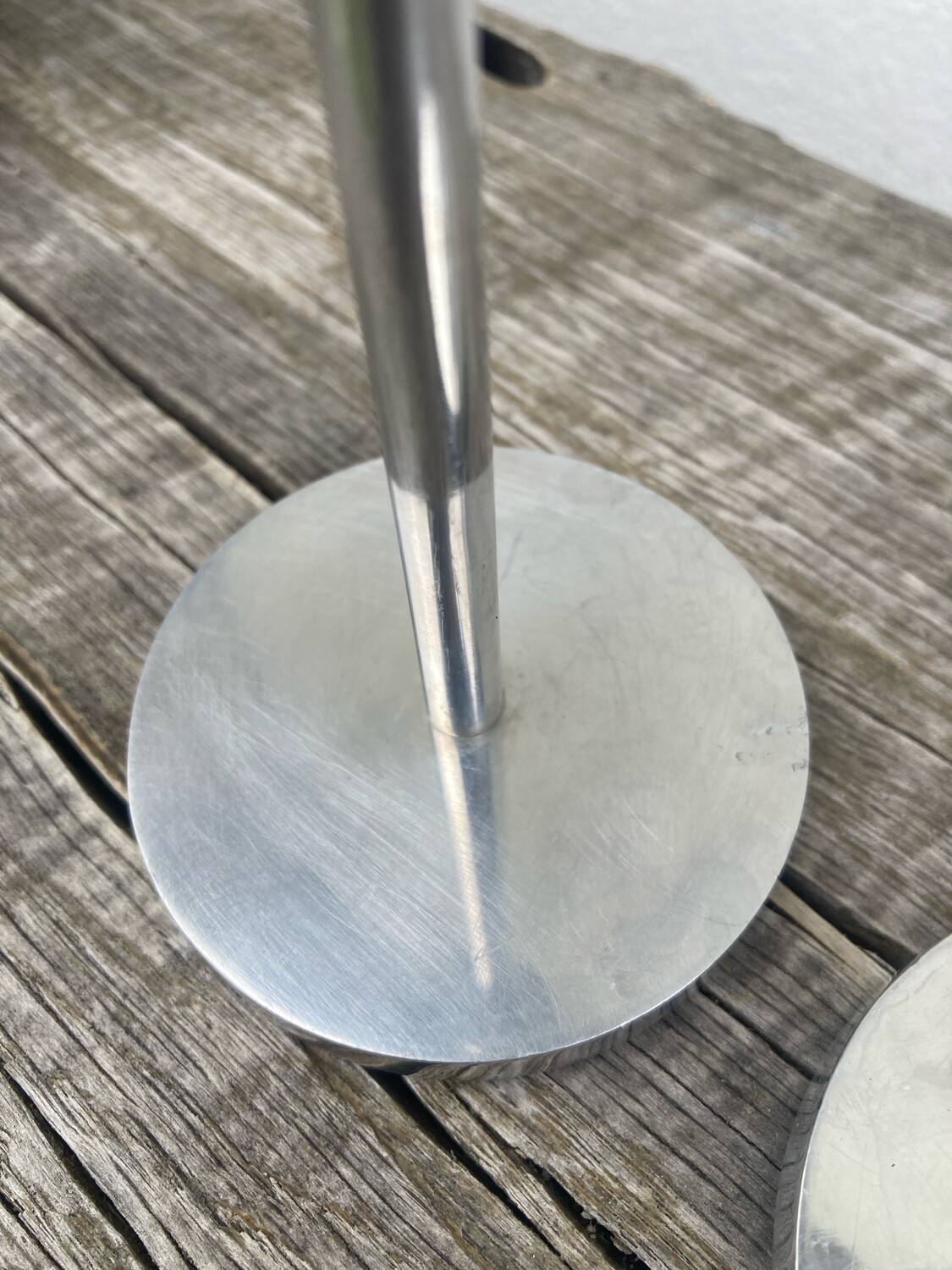 Pair of modernist aluminum candlesticks