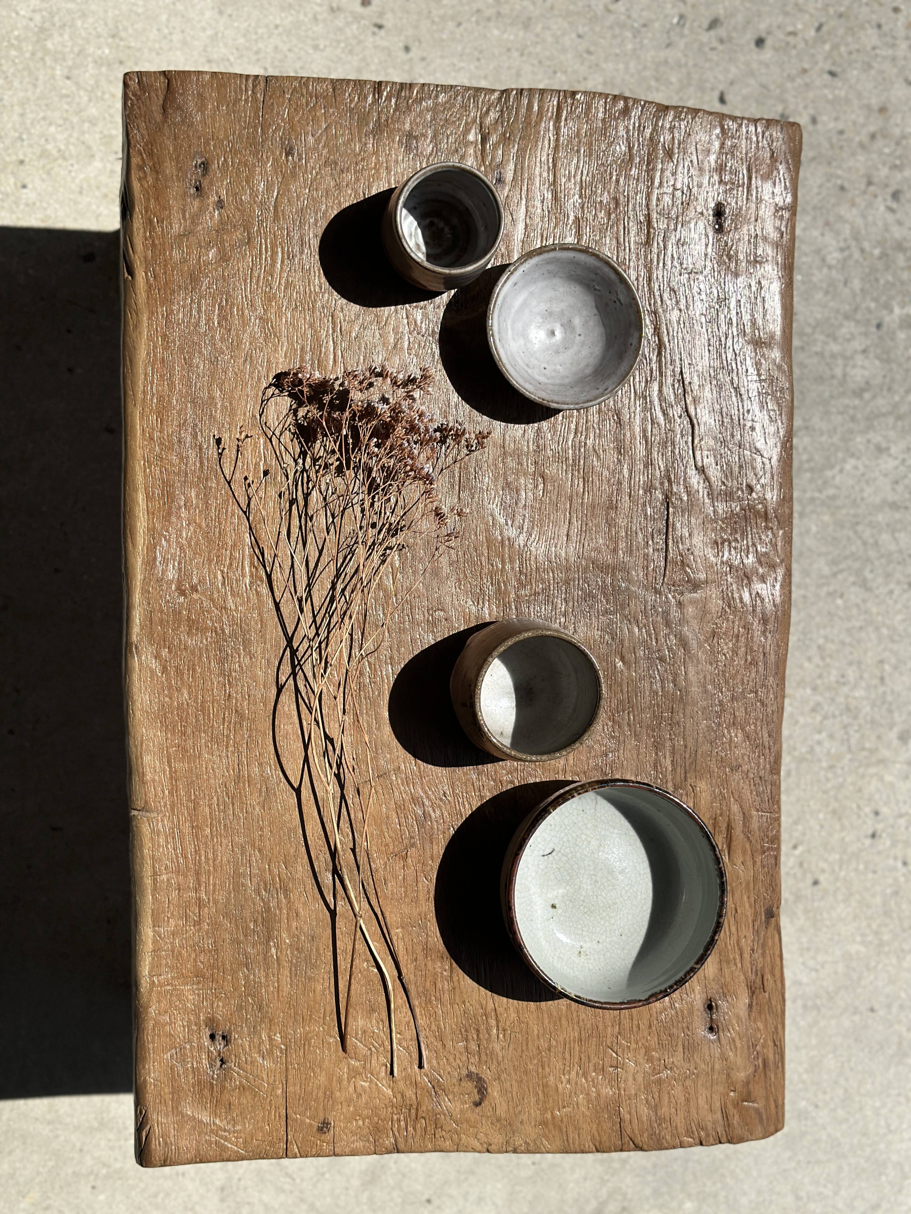Coffee table in blond teak quadripod