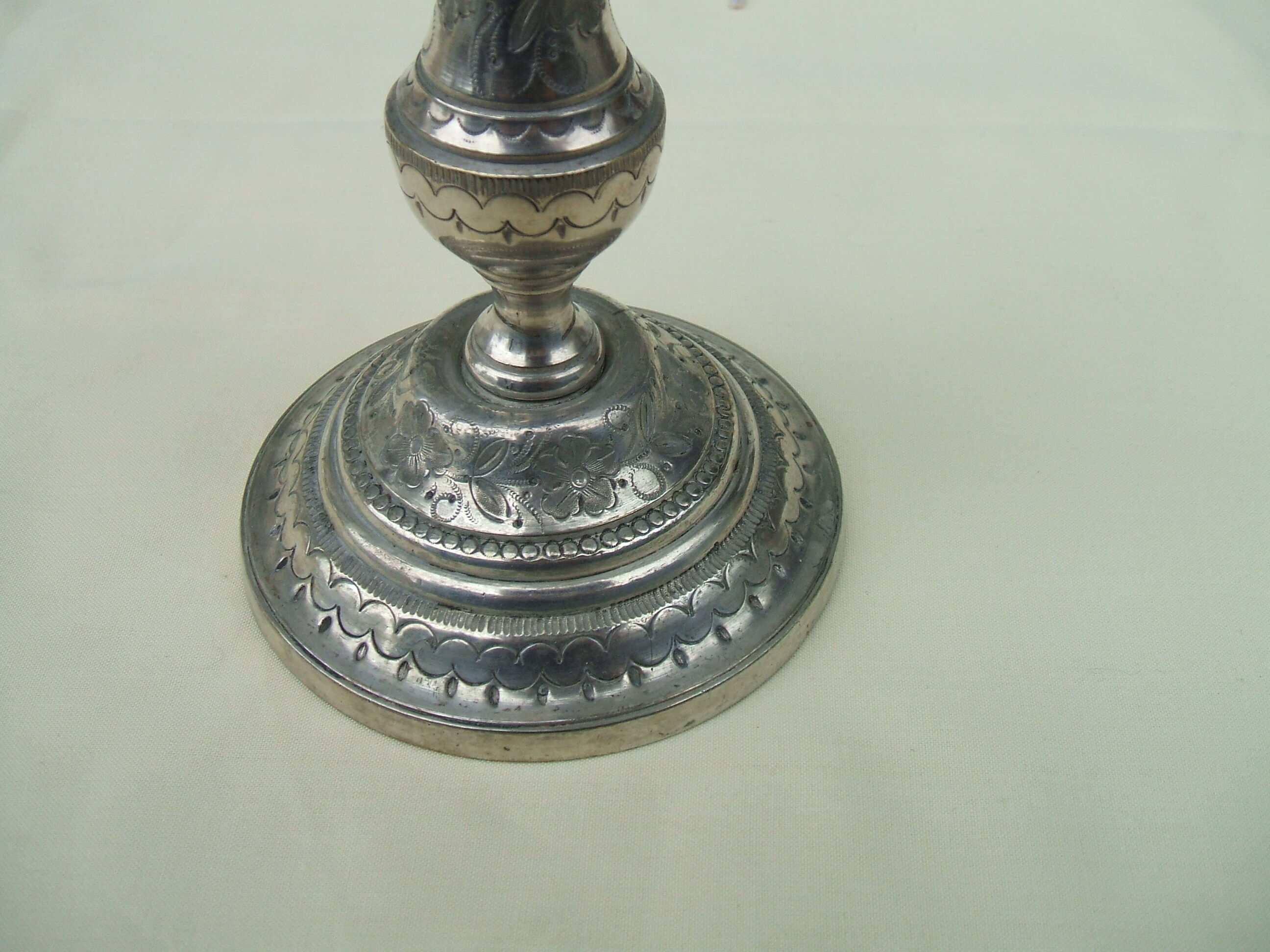 Pair of silver bronze candle holders