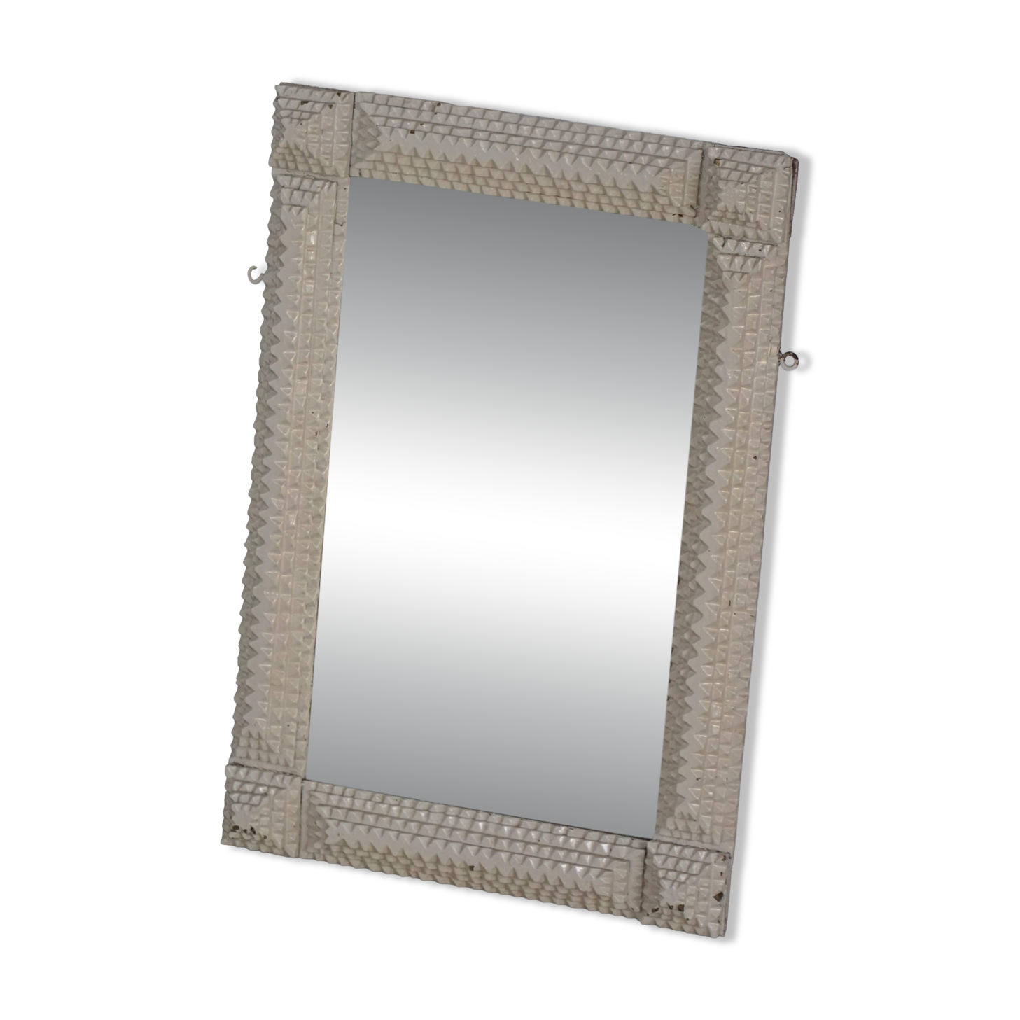 Wall mirror in tramp art style, hand-carved with a painted white frame, early 1900s.