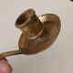 Antique hand-held candlestick in gilded bronze