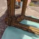 Large closed mirror, 19th century, wood and gilded stucco.