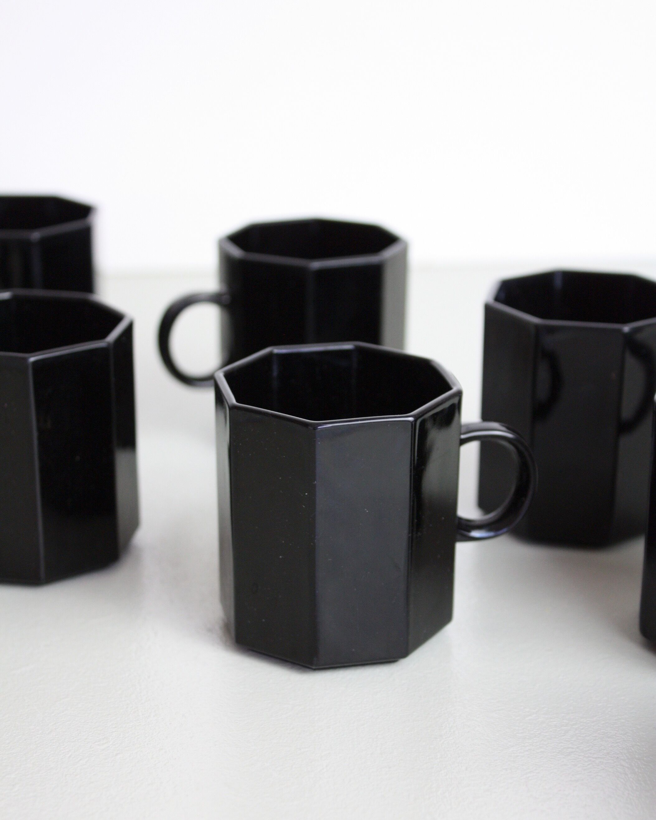 7 black cups Octime Arcoroc Esso collection