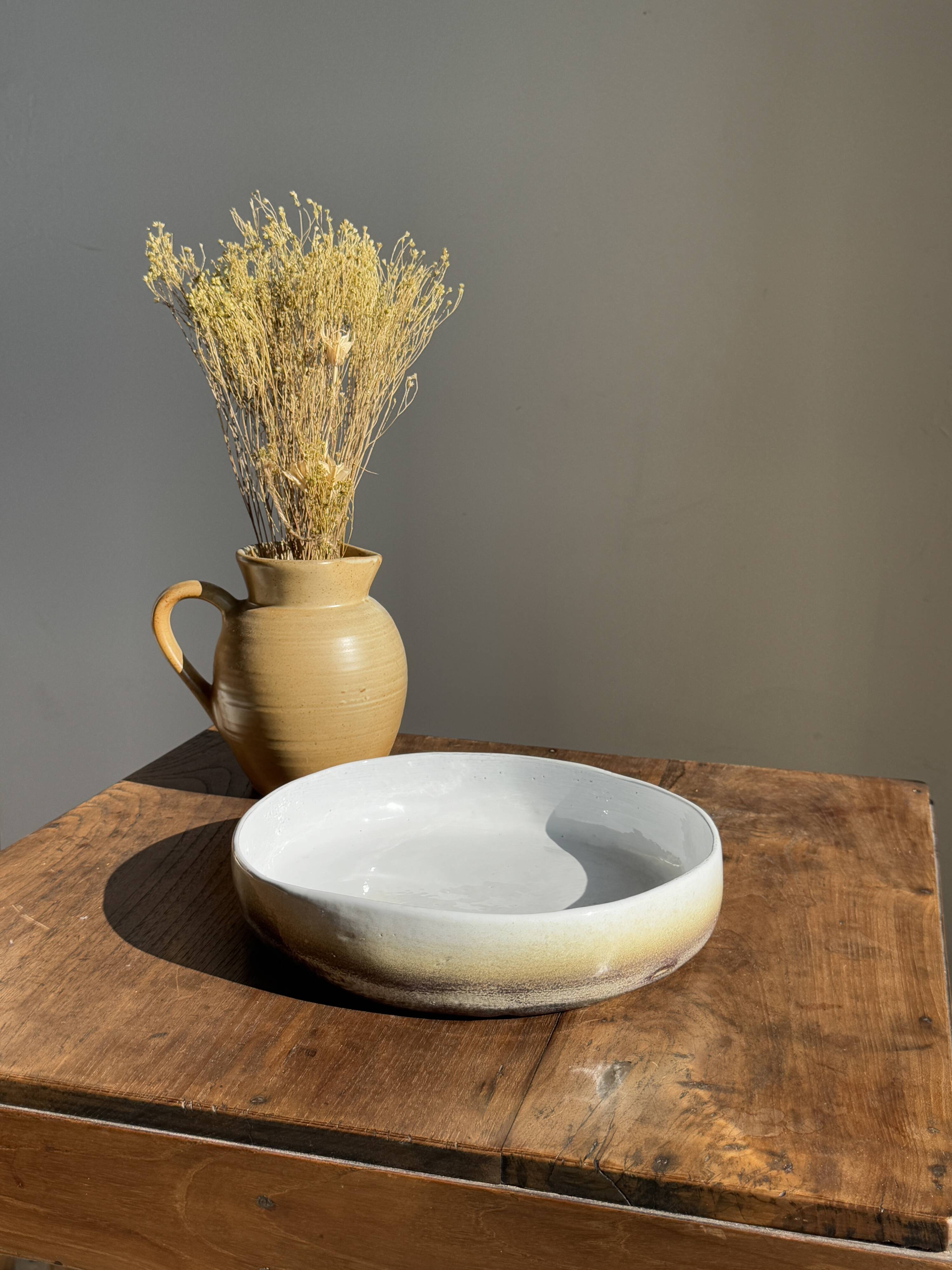Large white and earthenware ceramic dish