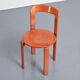 Rey chairs in stained red beech by Bruno Rey