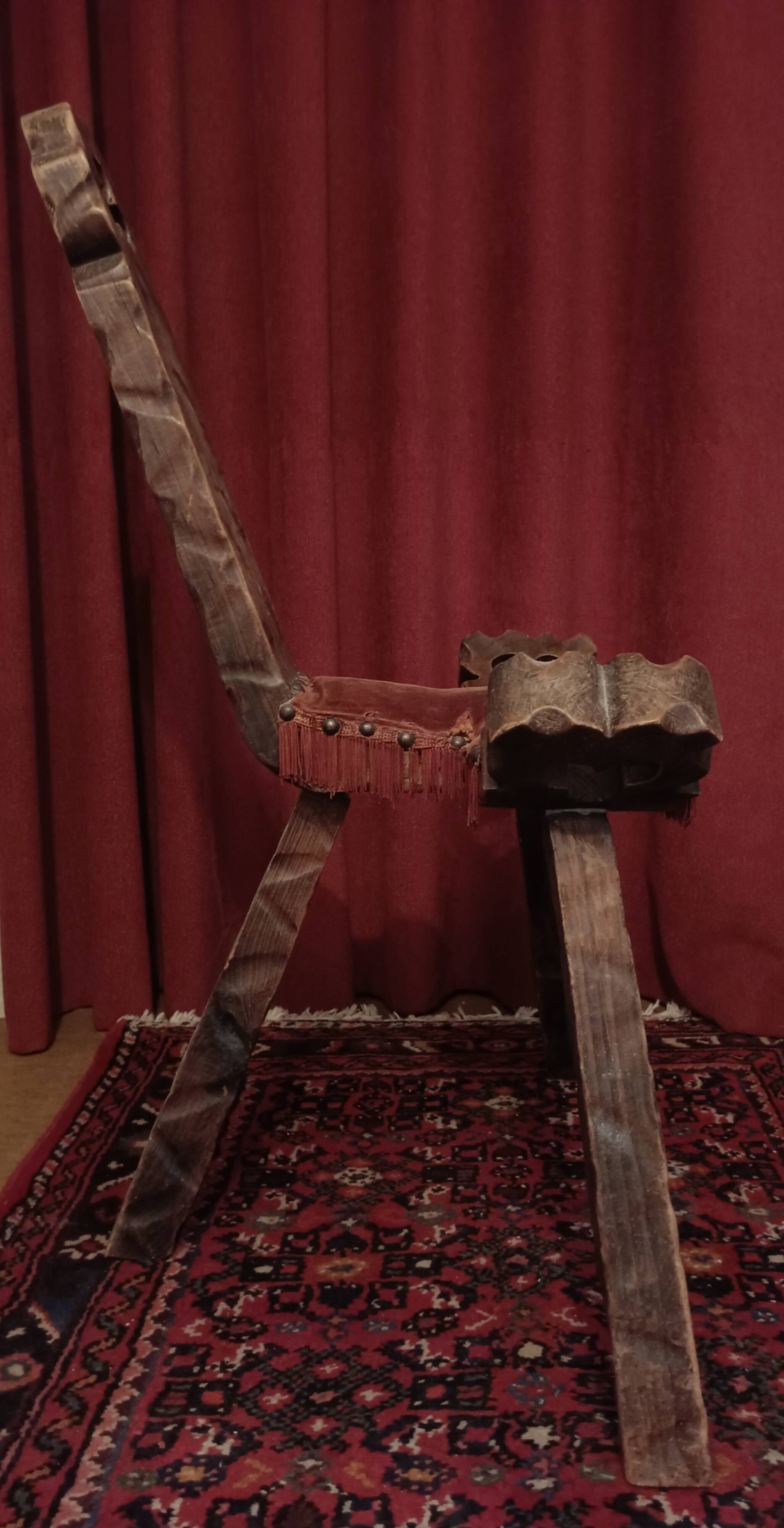 Brutalist chair with tripod legs