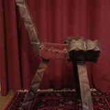 Brutalist chair with tripod legs