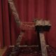 Brutalist chair with tripod legs