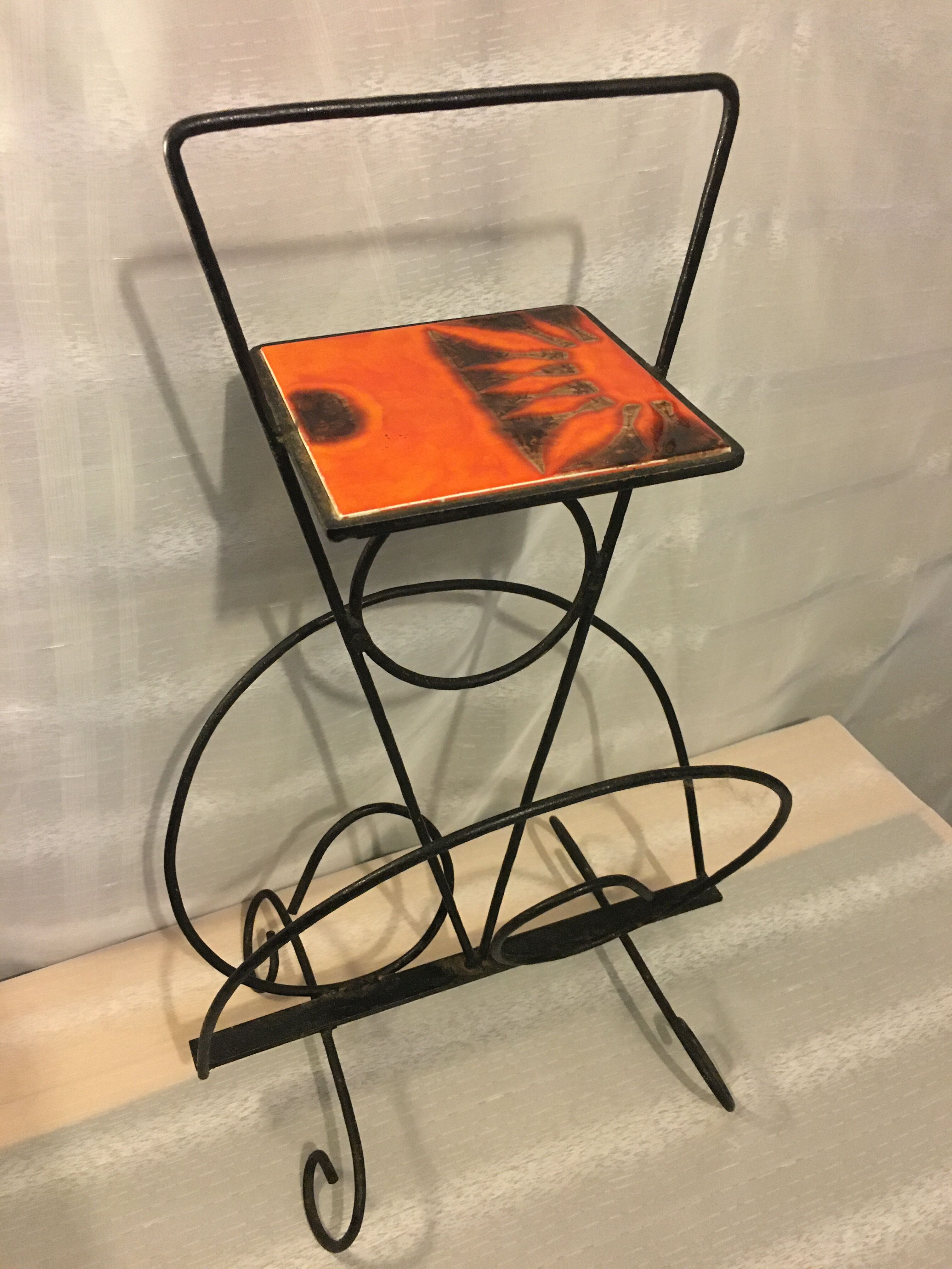 Wrought iron newspaper holder