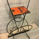 Wrought iron newspaper holder
