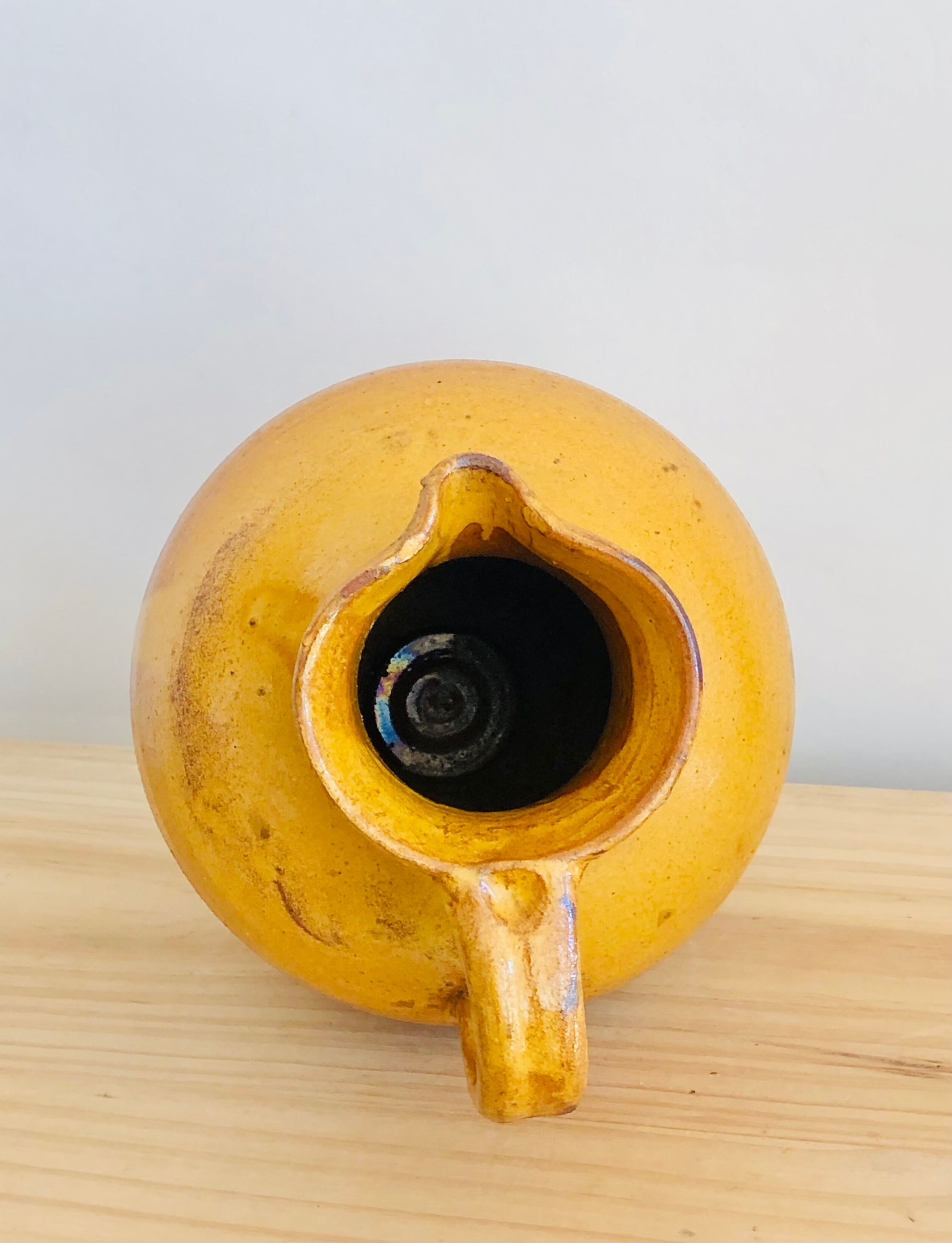 Vintage jug in glazed earth