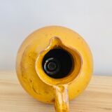 Vintage jug in glazed earth