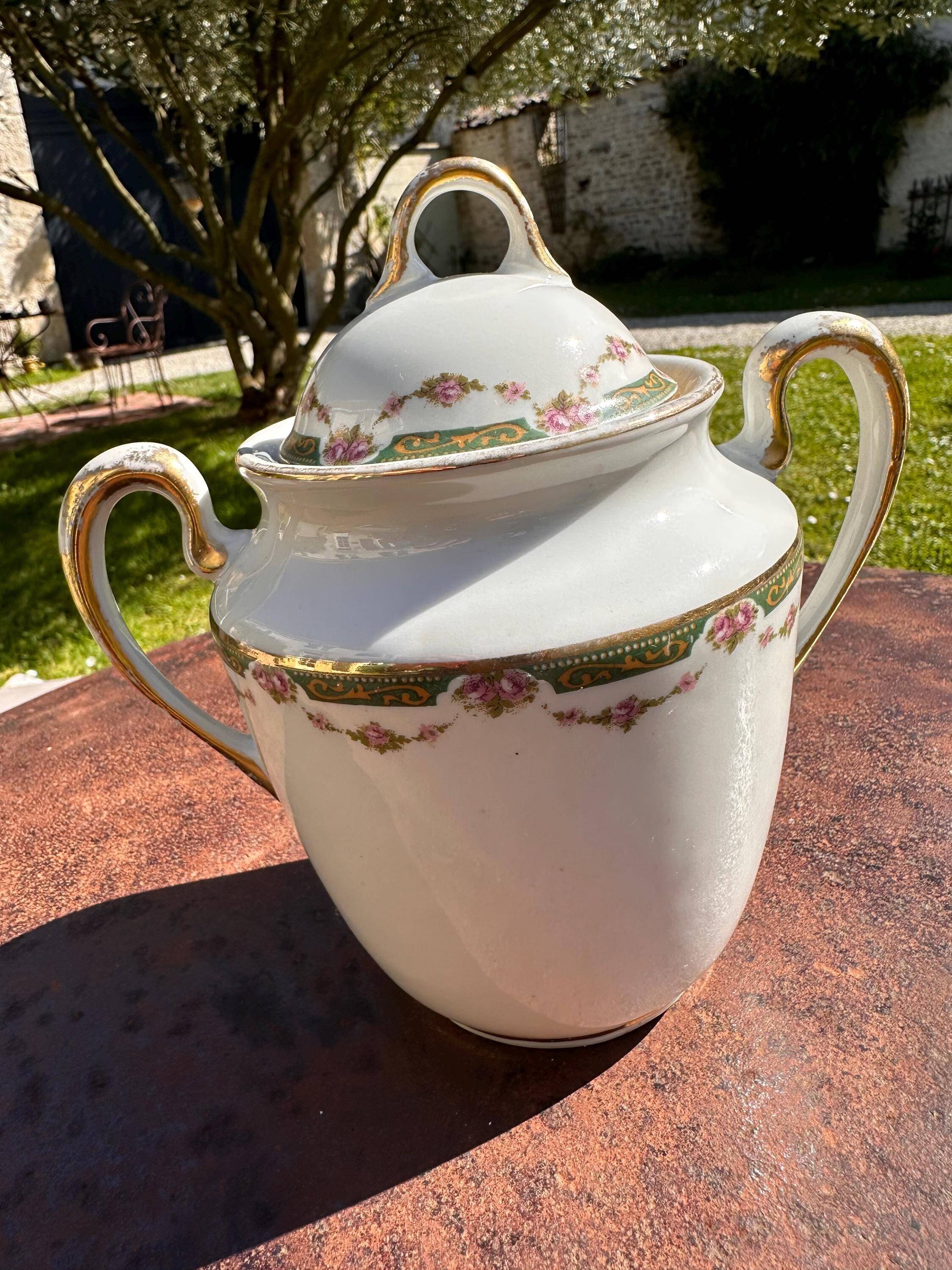 Set of jug, sugar bowl, and milk jug in Limoges porcelain by Paul Past.