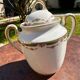 Set of jug, sugar bowl, and milk jug in Limoges porcelain by Paul Past.