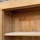 Parisian glass cabinet in solid raw oak, 1950