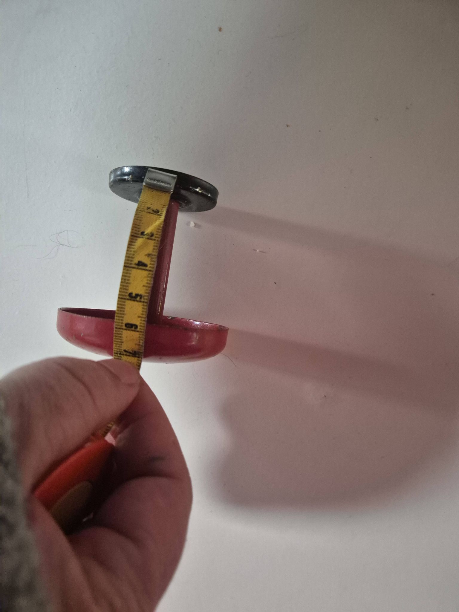 vintage red metal coat rack