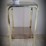 Golden side table and smoked glass