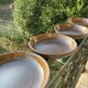 Deep plates made of organic, wild, earthy marsh clay.