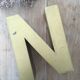 Golden vintage sign letter N