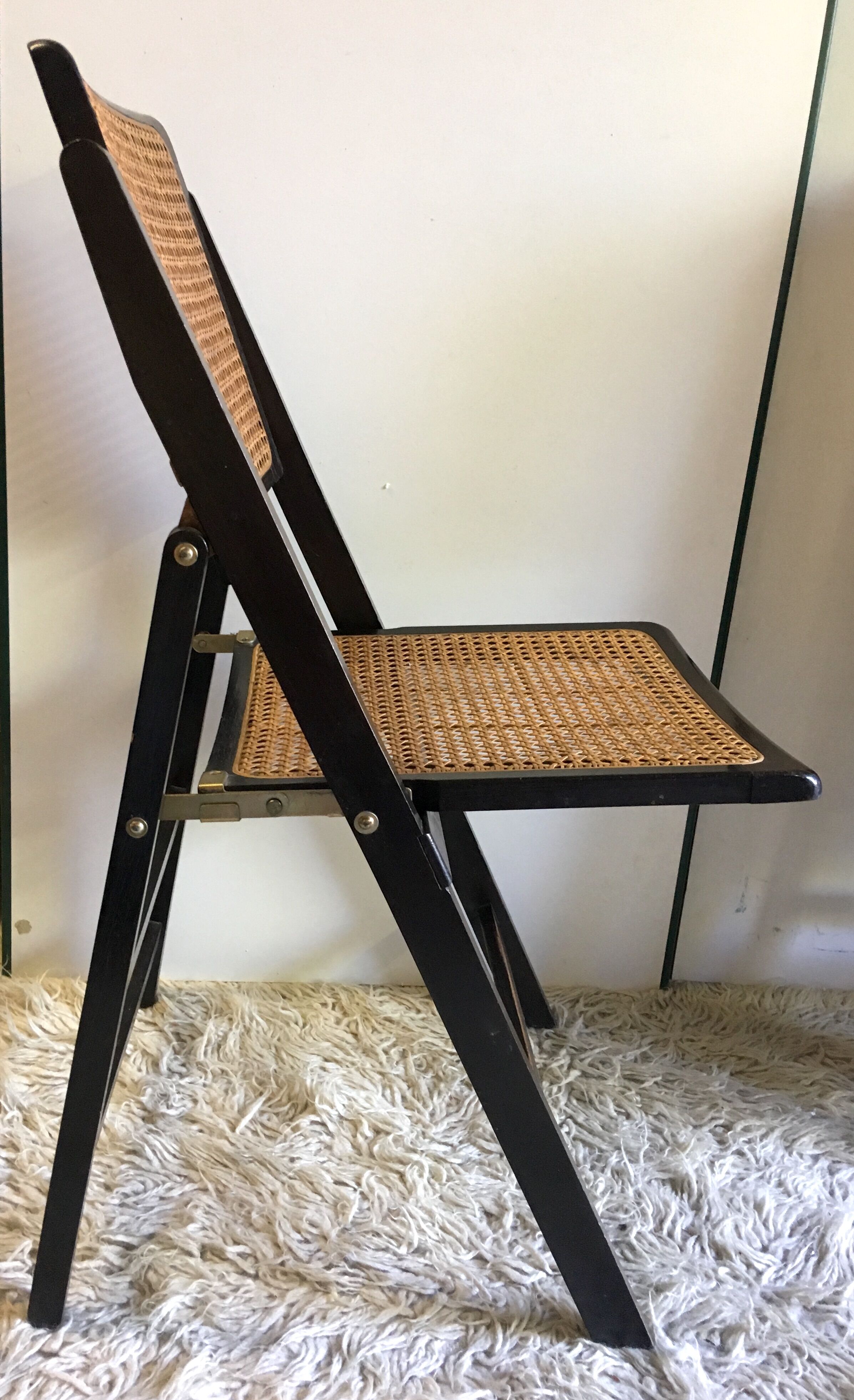 Four folding wooden and canning chairs - 70s