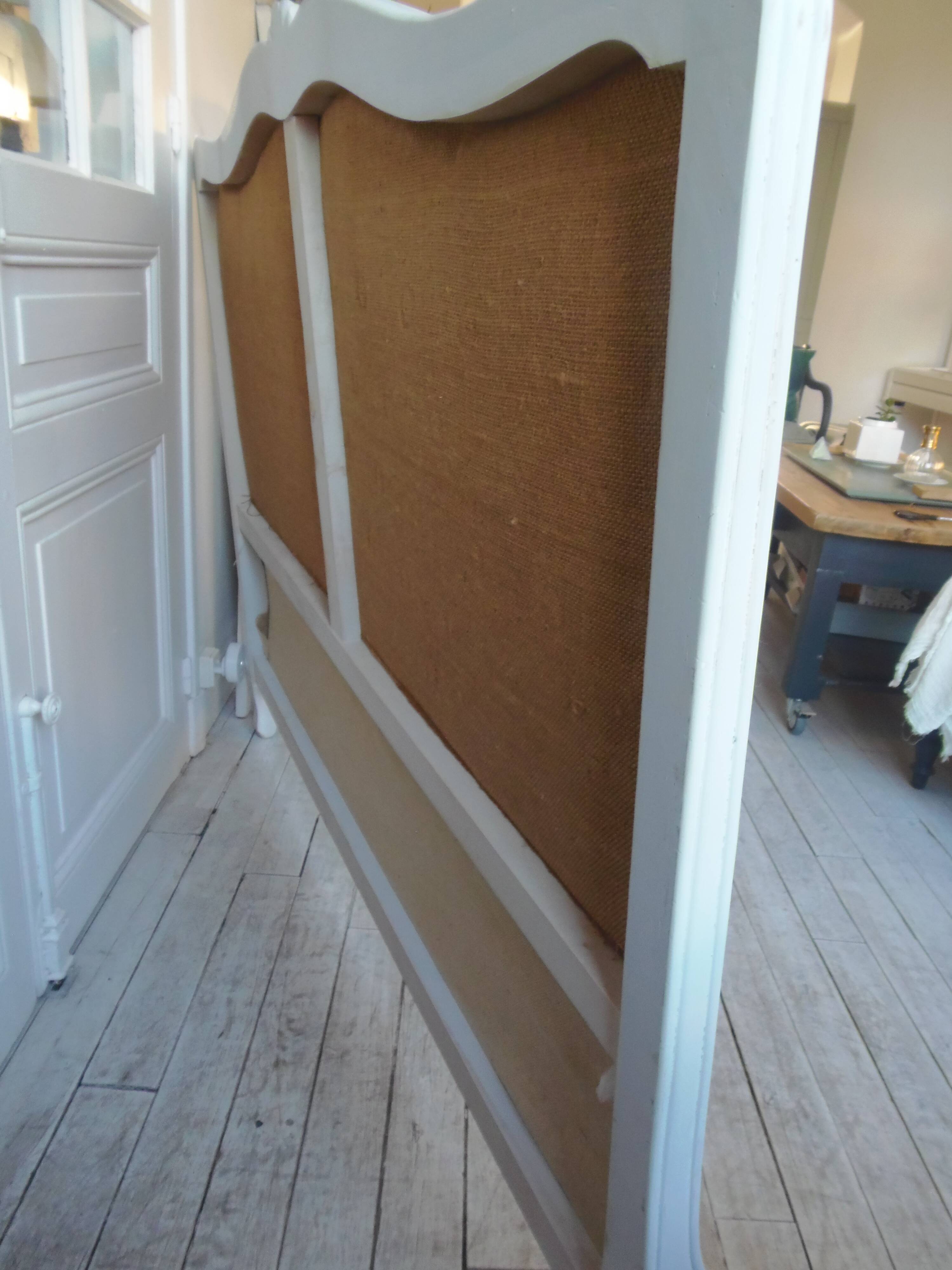 Louis XV style headboard with pearl grey patina, upholstered in off-white bouclette.