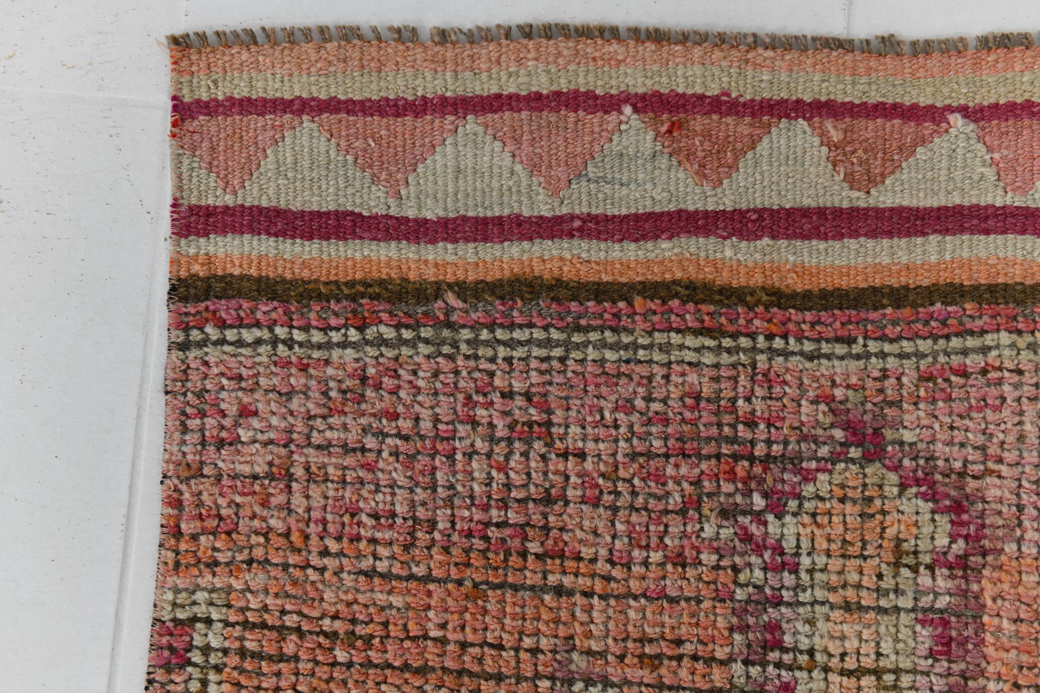 2x12 shades of pale orange vintage runner rug