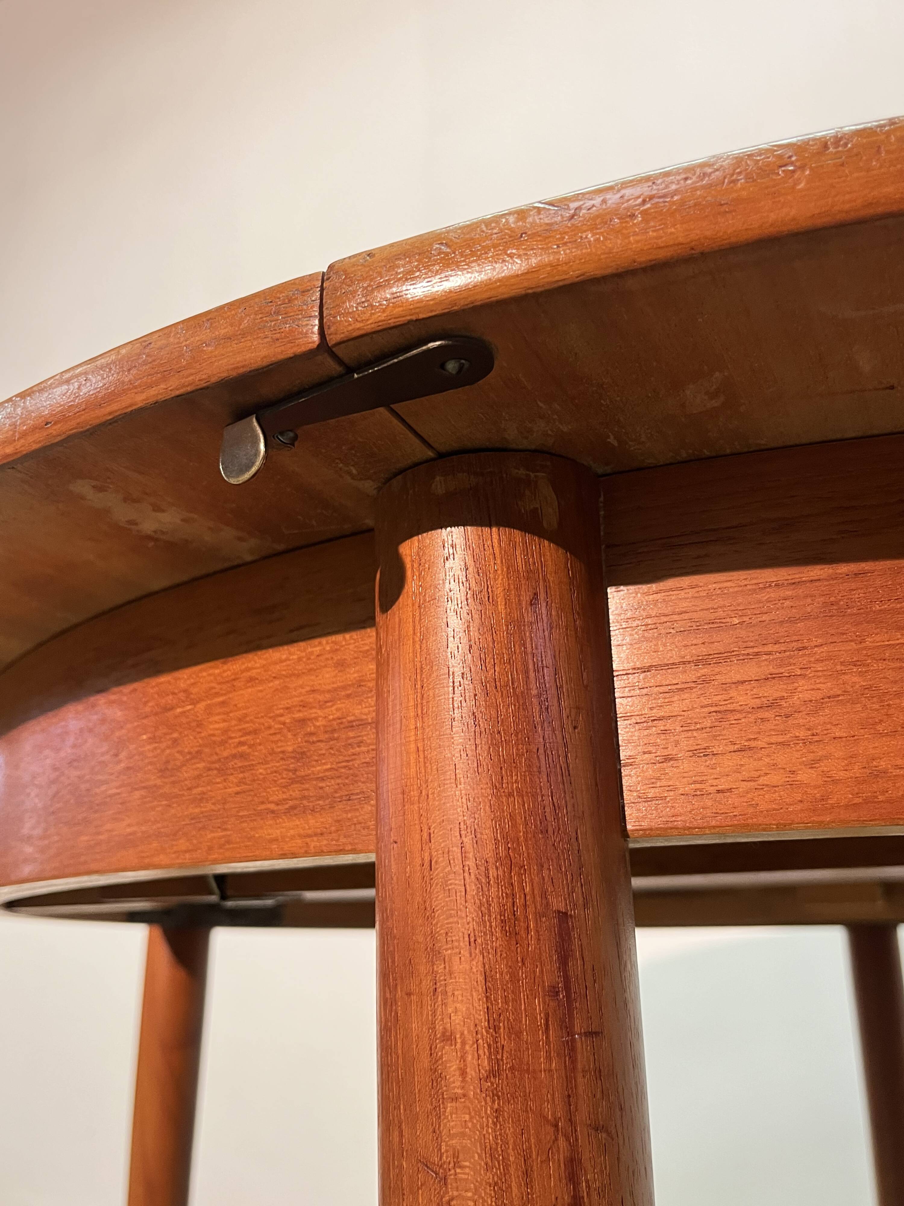 Vintage 1960s teak extendable Scandinavian table.