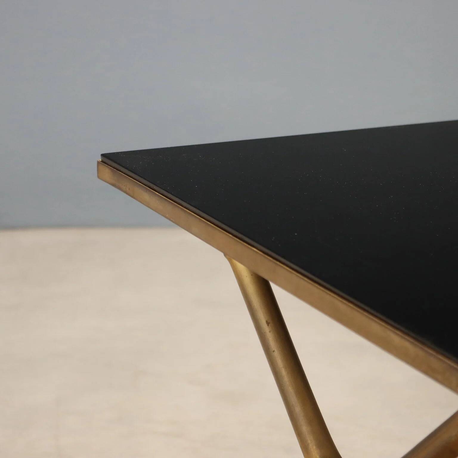 Coffee table from the 1950s-60s with a brass base.