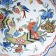 Decorative ceramic bird and cornucopia plate