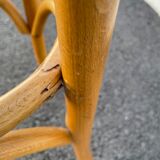 Curved wooden bar stool
