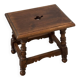 Small antique wooden stool with an openwork pattern.