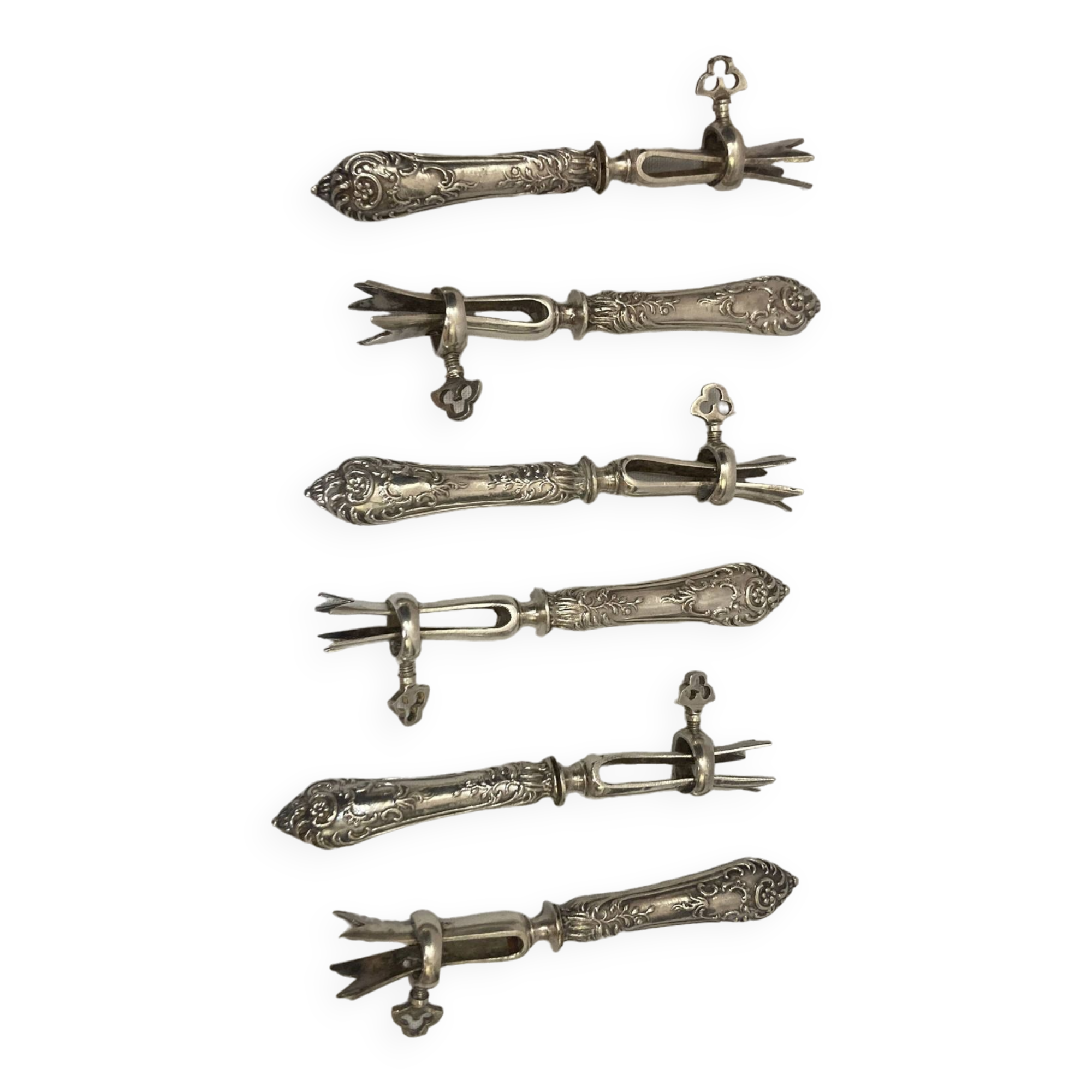 Silver duck sleeve clips, 19th century neck brace
