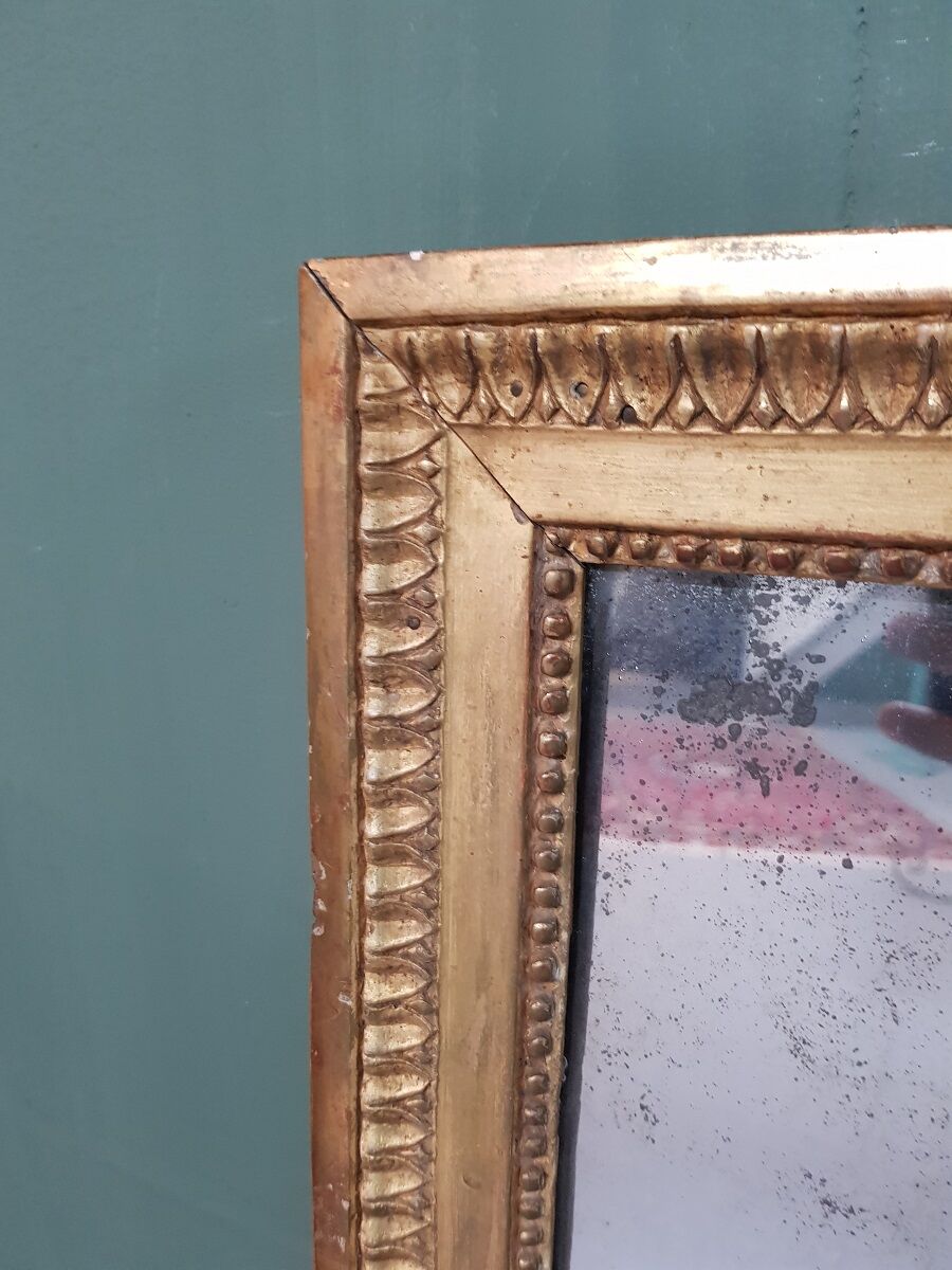 Antique french gilded Louis XVl mirror with mercury glass