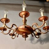 Bronze chandelier with double patina and 8 light arms.