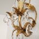 Hand-forged wall lamp gilded with gold leaf and crystals, Italy
