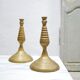 Pair of vintage candle holders in golden brass