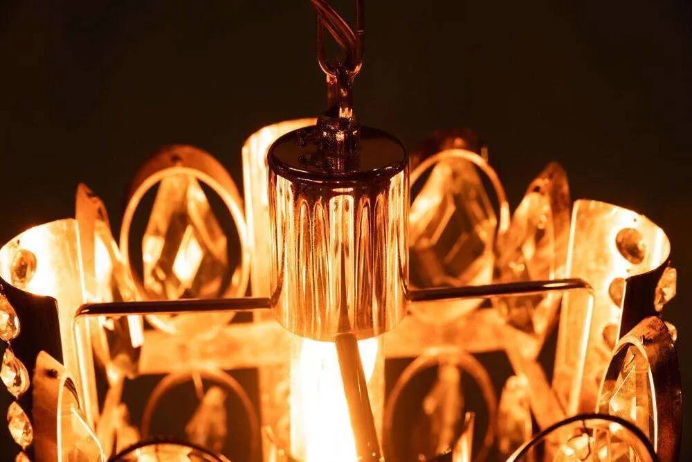 Palwa mid-century suspended chandelier in crystal, glass and brass.